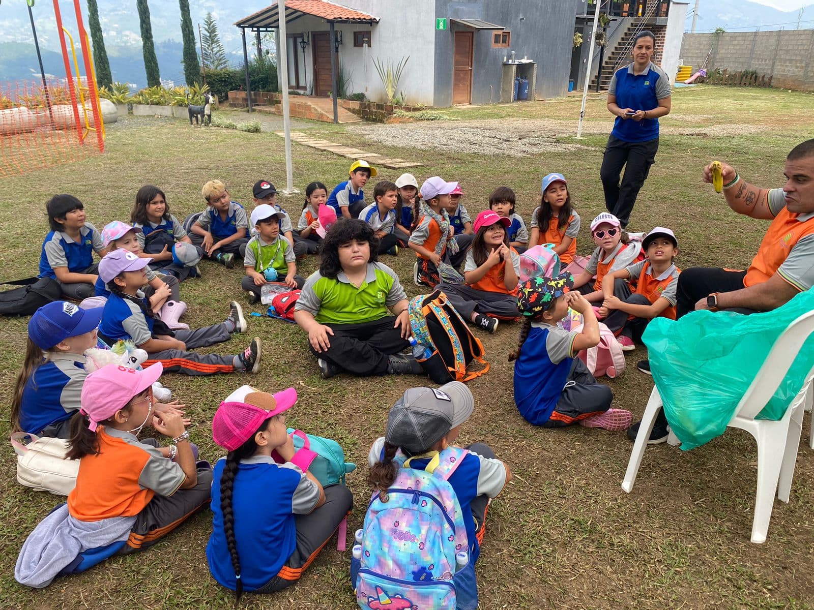 Preschool Children Doing Hand Exercise With Teachers