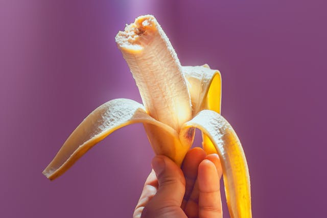 Peeled Banana in Hand